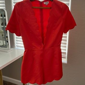 Deep cut jumpsuit orange